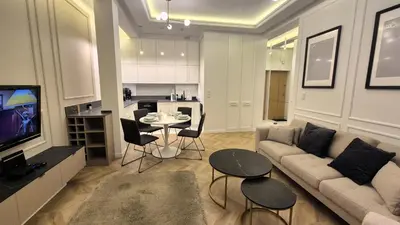 Telewizja i/lub zestaw kina domowego w obiekcie Apt Ligocka Premium - Apartamenty Wypoczynkowe