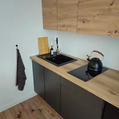 Kuchnia lub aneks kuchenny w obiekcie Smulikowskiego Flat 25