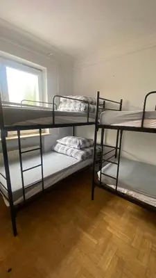 Łóżko lub łóżka w pokoju w obiekcie Dom SOFIIA