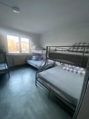 Łóżko lub łóżka w pokoju w obiekcie Dom SOFIIA