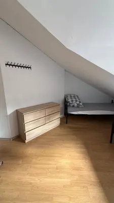Łóżko lub łóżka w pokoju w obiekcie Dom SOFIIA