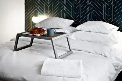 Łóżko lub łóżka w pokoju w obiekcie P&O Apartments Warecka III