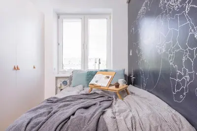 Łóżko lub łóżka w pokoju w obiekcie Bon Voyage Apartment Ochota
