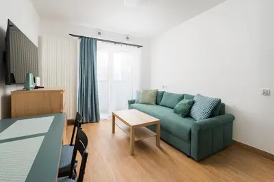 Część wypoczynkowa w obiekcie Praga Bliska Pleasant Studio by BookingHost