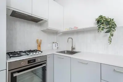 Kuchnia lub aneks kuchenny w obiekcie Creme de la Creme 2 Bedroom Apartment Mokotow