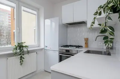Kuchnia lub aneks kuchenny w obiekcie Creme de la Creme 2 Bedroom Apartment Mokotow