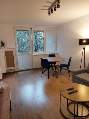 Część wypoczynkowa w obiekcie Cosy apartment Muranów