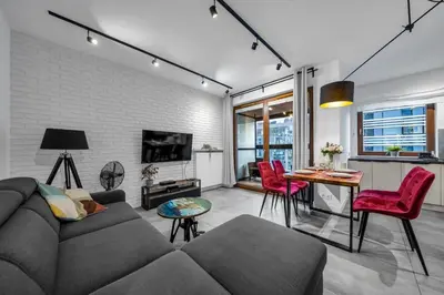 Telewizja i/lub zestaw kina domowego w obiekcie Warsaw Grzybowska Apartment with Parking - by Rentujemy
