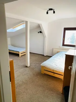 Łóżko lub łóżka w pokoju w obiekcie Marki hostel