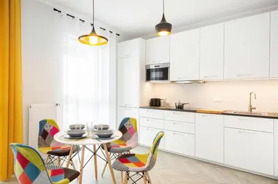 Kuchnia lub aneks kuchenny w obiekcie Large Apartment in Rondo Wiatraczna by Noclegi Renters