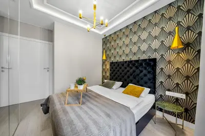 Łóżko lub łóżka w pokoju w obiekcie Wola Apartment - 9th Floor, Parking & Balcony - by Rentujemy