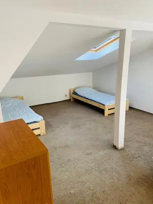 Łóżko lub łóżka w pokoju w obiekcie Marki hostel