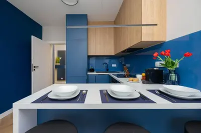 Kuchnia lub aneks kuchenny w obiekcie Apartament w Sercu Warszawy Biurko do Pracy Zdalnej by Noclegi Renters