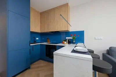 Kuchnia lub aneks kuchenny w obiekcie Apartament w Sercu Warszawy Biurko do Pracy Zdalnej by Noclegi Renters