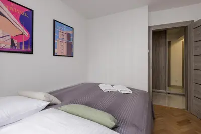 Łóżko lub łóżka w pokoju w obiekcie ShortStayPoland Twarda B35