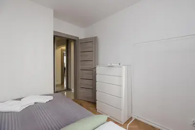Łóżko lub łóżka w pokoju w obiekcie ShortStayPoland Twarda B35