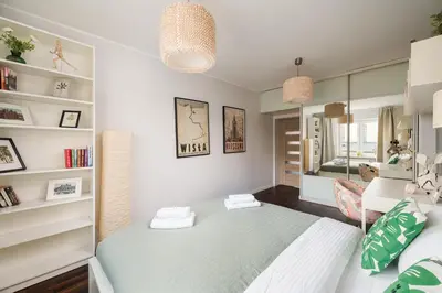 Łóżko lub łóżka w pokoju w obiekcie Elektoralna Charming Apartment by BookingHost