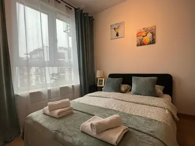 Łóżko lub łóżka w pokoju w obiekcie Rental Apartments Jutrzenki