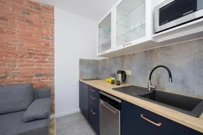 Kuchnia lub aneks kuchenny w obiekcie BK studio - cozy and modern close to National Stadium