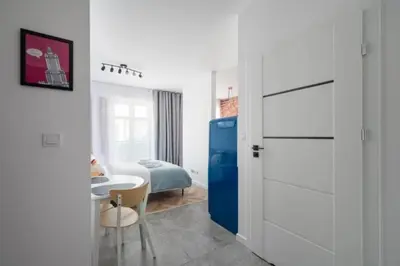Łóżko lub łóżka w pokoju w obiekcie BK studio - cozy and modern close to National Stadium