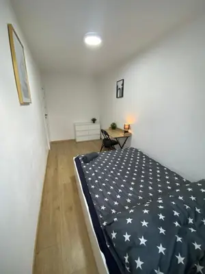 Łóżko lub łóżka w pokoju w obiekcie Rooms in Warsaw - G39