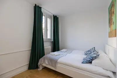 Łóżko lub łóżka w pokoju w obiekcie ShortStayPoland Waliców B171