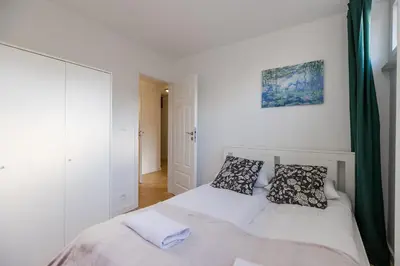 Łóżko lub łóżka w pokoju w obiekcie ShortStayPoland Waliców B171