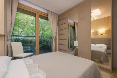 Łóżko lub łóżka w pokoju w obiekcie Warsaw Hub Daszynskiego Apartment