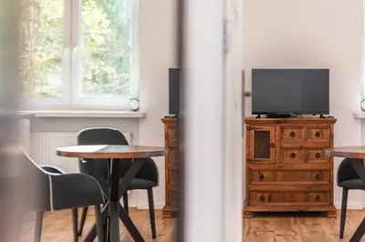 Telewizja i/lub zestaw kina domowego w obiekcie aleja Wyzwolenia 14A by Homeprime
