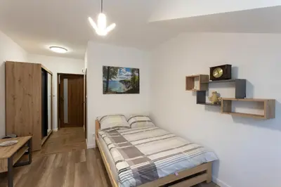 Łóżko lub łóżka w pokoju w obiekcie U Wojtka