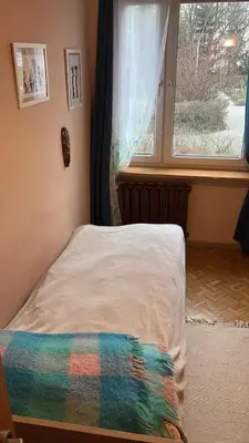 Łóżko lub łóżka w pokoju w obiekcie Pokoje Warszawa Ursynów