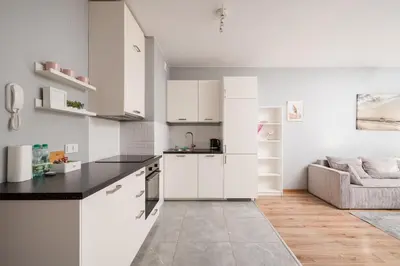 Kuchnia lub aneks kuchenny w obiekcie Warszawa-Włochy Serene Apartment by BookingHost