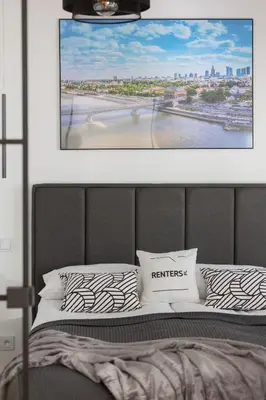 Łóżko lub łóżka w pokoju w obiekcie Warsaw City Life Apartment Bagno by Noclegi Renters
