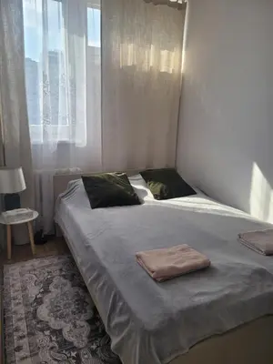 Łóżko lub łóżka w pokoju w obiekcie Pereca 2, air conditioning, parking