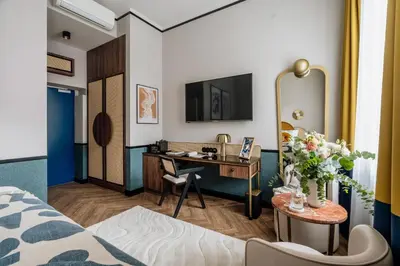 Telewizja i/lub zestaw kina domowego w obiekcie Colette by StayLab