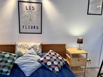 Łóżko lub łóżka w pokoju w obiekcie OhMyHome-Ogrodowa
