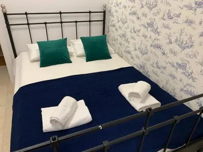Łóżko lub łóżka w pokoju w obiekcie Koszykowa 33 by Homeprime