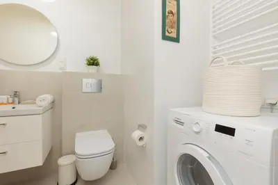 Łazienka w obiekcie Stylish Apartment Zdziechowskiego with Parking & Home Office by Noclegi Renters