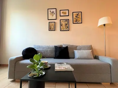 Część wypoczynkowa w obiekcie Uroczy Apartament z widokiem na centrum i darmowym parkinigiem