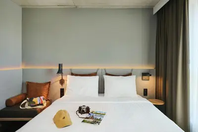 Łóżko lub łóżka w pokoju w obiekcie Moxy Warsaw City