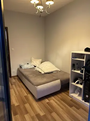 Łóżko lub łóżka w pokoju w obiekcie Modern Nest Warsaw