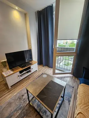 Telewizja i/lub zestaw kina domowego w obiekcie Apartament Centrum Rondo ONZ