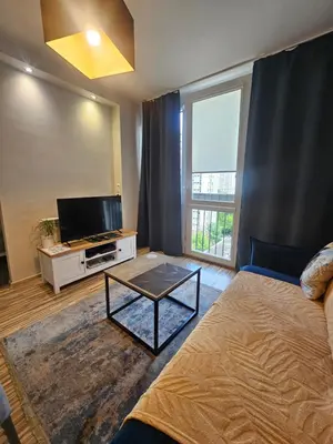 Telewizja i/lub zestaw kina domowego w obiekcie Apartament Centrum Rondo ONZ