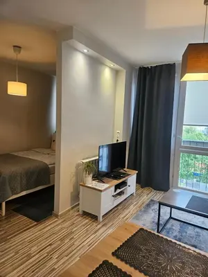 Telewizja i/lub zestaw kina domowego w obiekcie Apartament Centrum Rondo ONZ