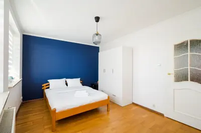Łóżko lub łóżka w pokoju w obiekcie Bemowo Narwik Malachite Apartment by BookingHost