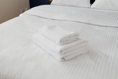 Łóżko lub łóżka w pokoju w obiekcie Bemowo Narwik Malachite Apartment by BookingHost