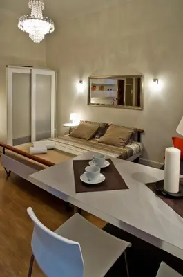 Łóżko lub łóżka w pokoju w obiekcie Residence Okólnik Apartments