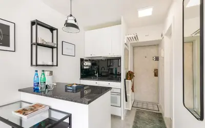 Kuchnia lub aneks kuchenny w obiekcie Plac Grzybowski Studio near Metro Świętokrzyska by Noclegi Renters