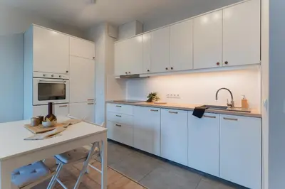 Kuchnia lub aneks kuchenny w obiekcie Stylowy Apartament przy Metrze, przy Centrum Onkologii