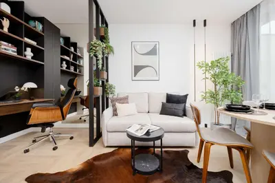 Część wypoczynkowa w obiekcie Apartment Sarmacka Wilanów with Parking, Sauna & Gym by Noclegi Renters